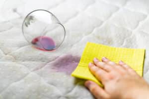 sponge cleaning wine stain dropped wineglass spilled wine white couch איך מנקים כתם ממזרון